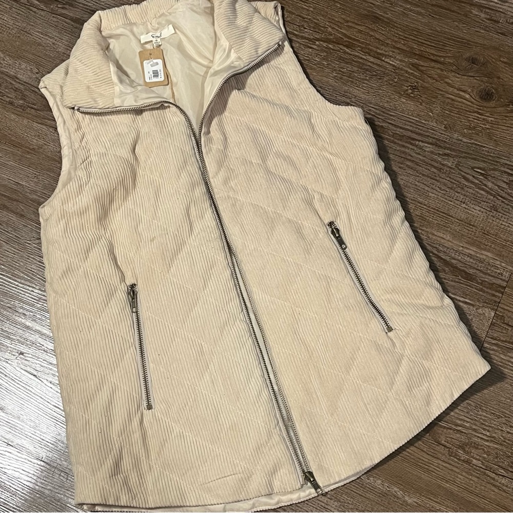 Boutique cream corduroy zip up vest.